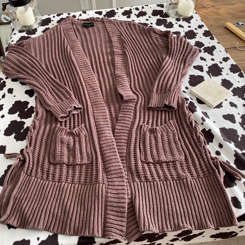 Women’s brown knit duster with braided side detail